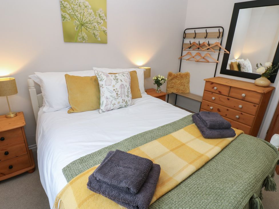 A bedroom with a bed and furniture at 57 Cockpit Hill Northallerton