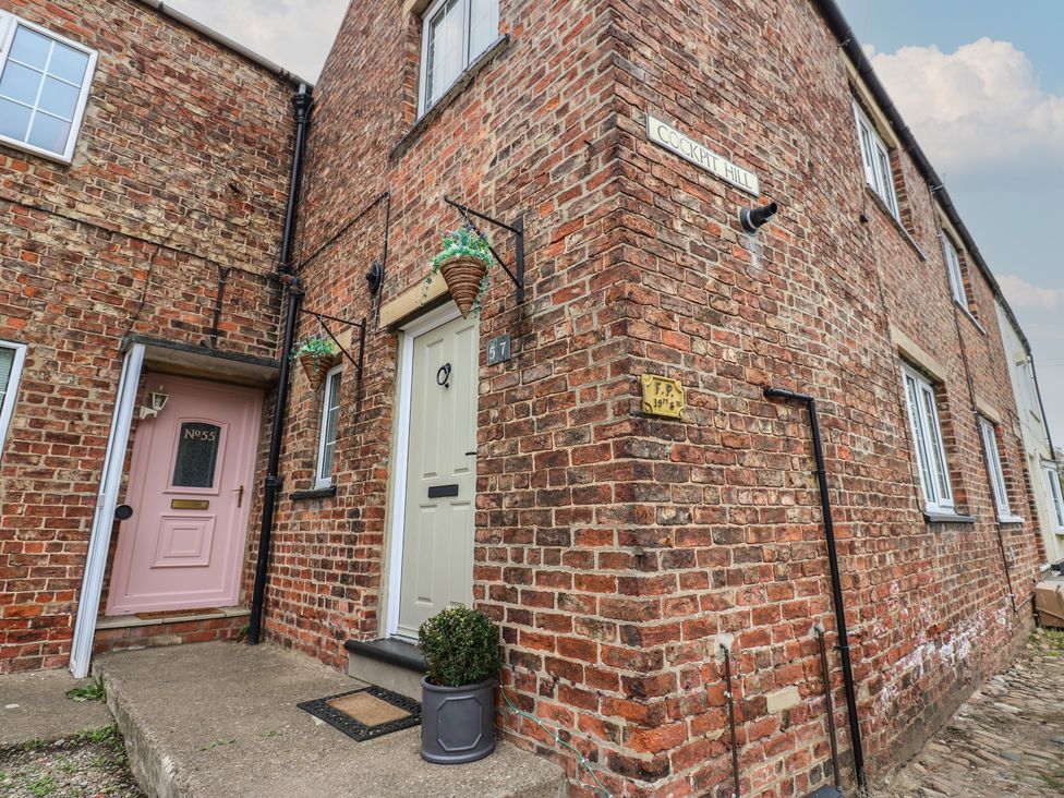 An entrance with two doors at 57 Cockpit Hill in Northallerton