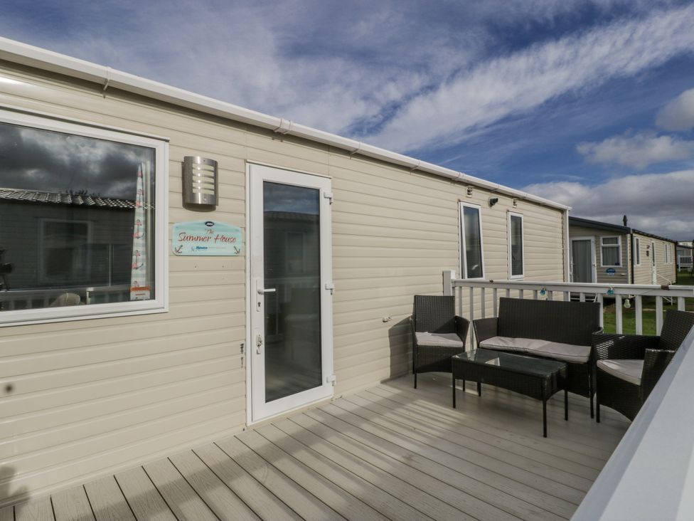 An outdoor area with furniture at Caravan - 2 Bayside in Watchet