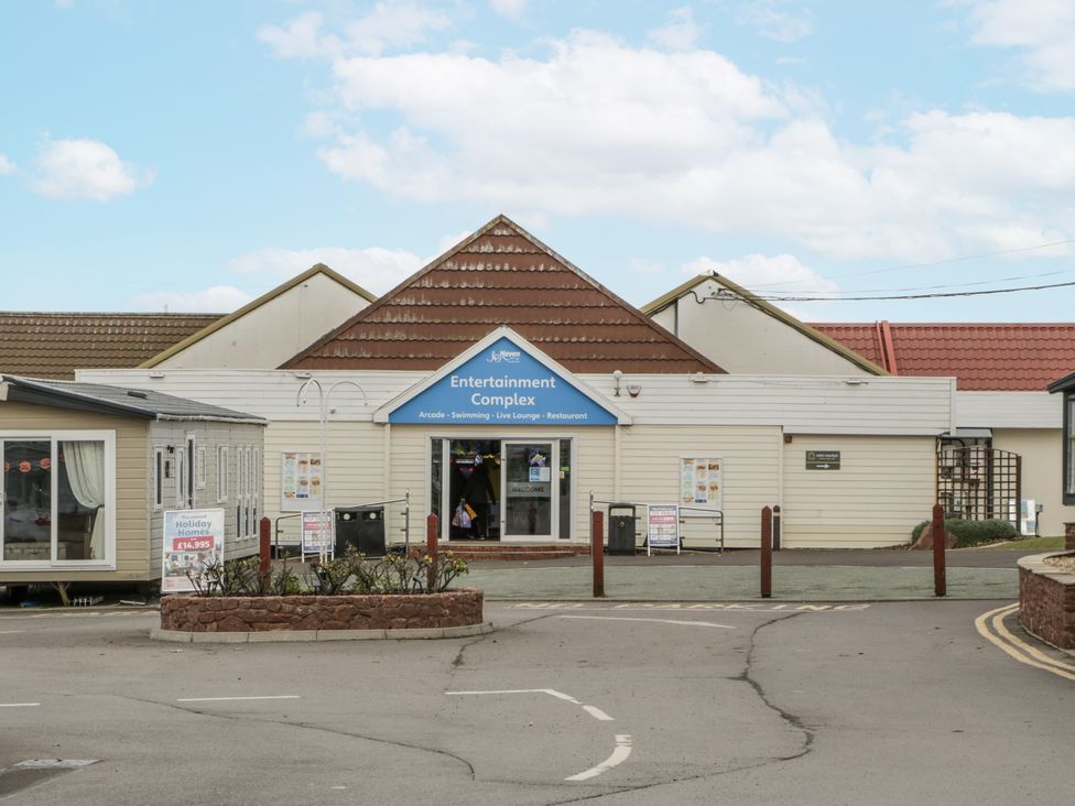 An entertainment complex with a sign at Caravan - 2 Bayside Watchet