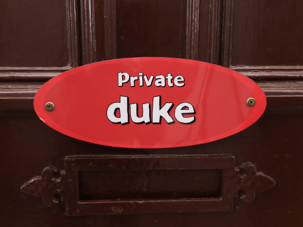 A door sign labeled 'Private duke' at Duke Cottage in Woodbridge