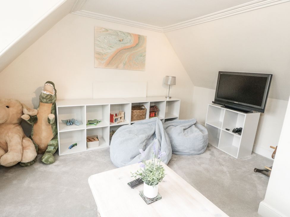 A snug with bean bags and a television at Rowan Tree House in Brechin