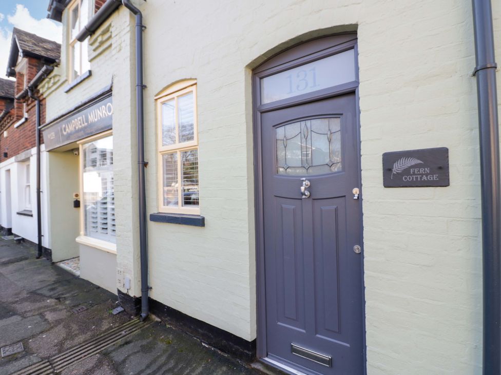 A front door with a sign labeled Fern Cottage at Fern Cottage in Lichfield
