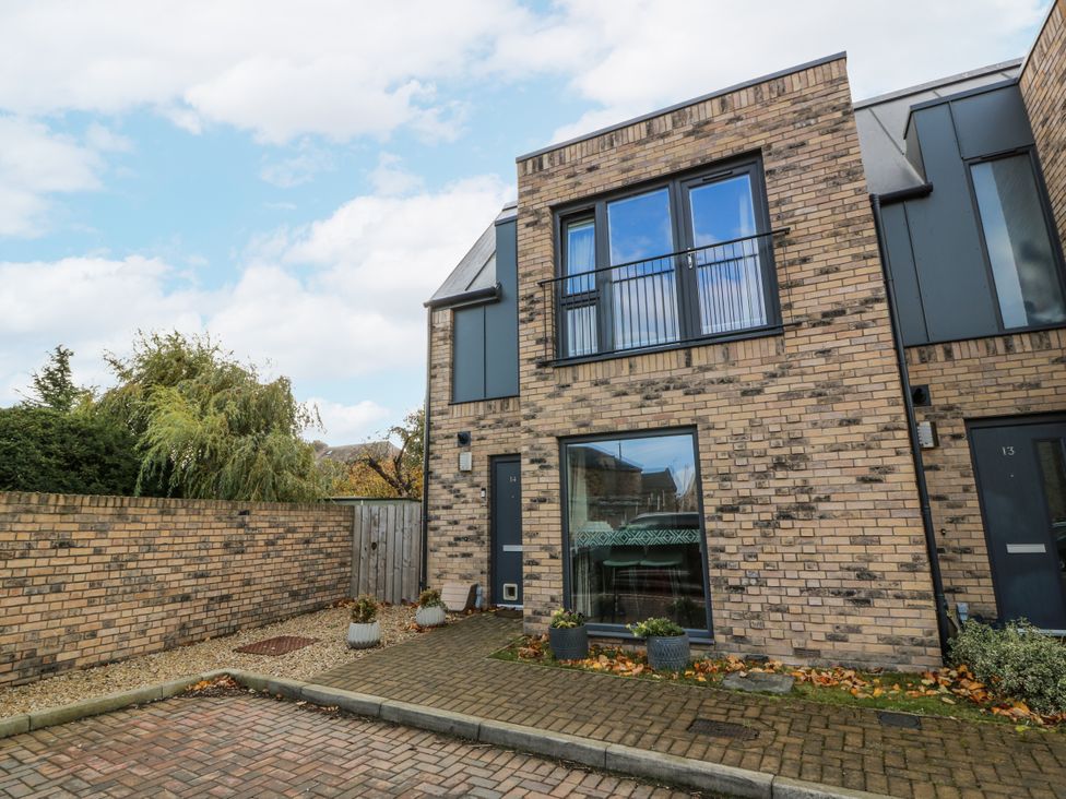 A building with windows and doors at 14 Old Market Place Bonnyrigg