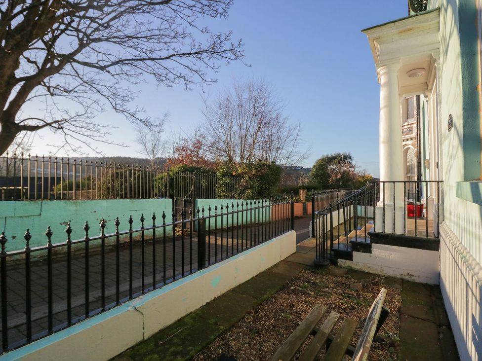 An outdoor area with steps leading up to a building at 8 Corkickle Whitehaven