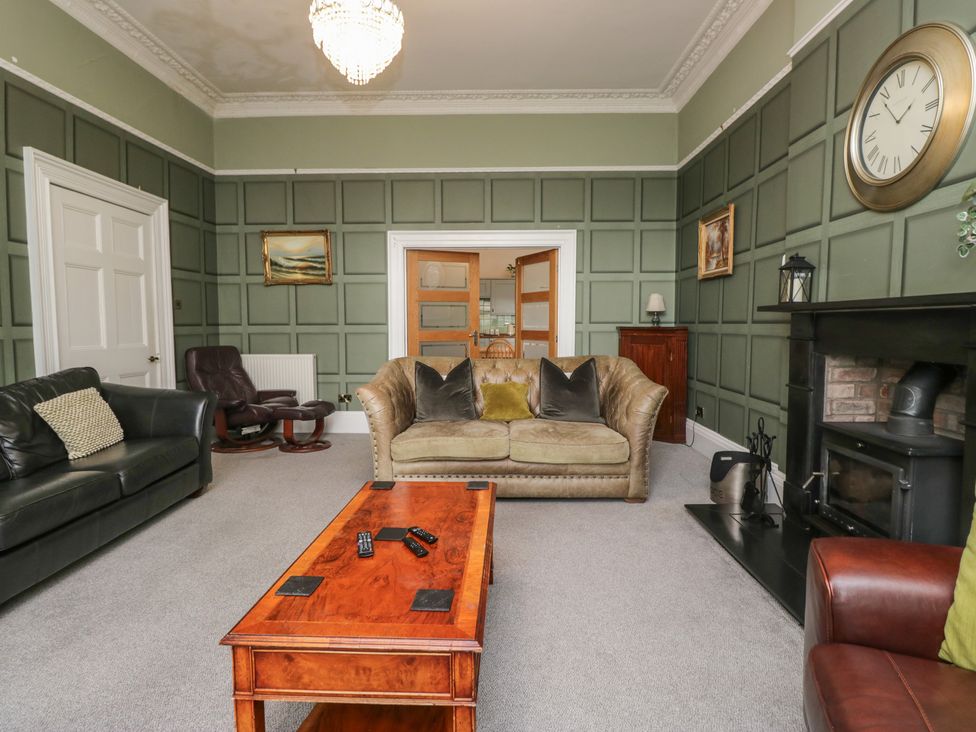 A living room with a sofa and coffee table at 8 Corkickle Whitehaven