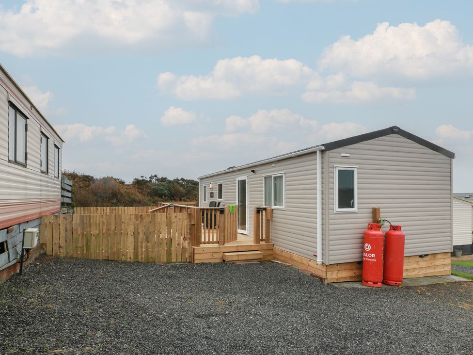 A house with a deck and gas canisters at Ellies House in Stranraer