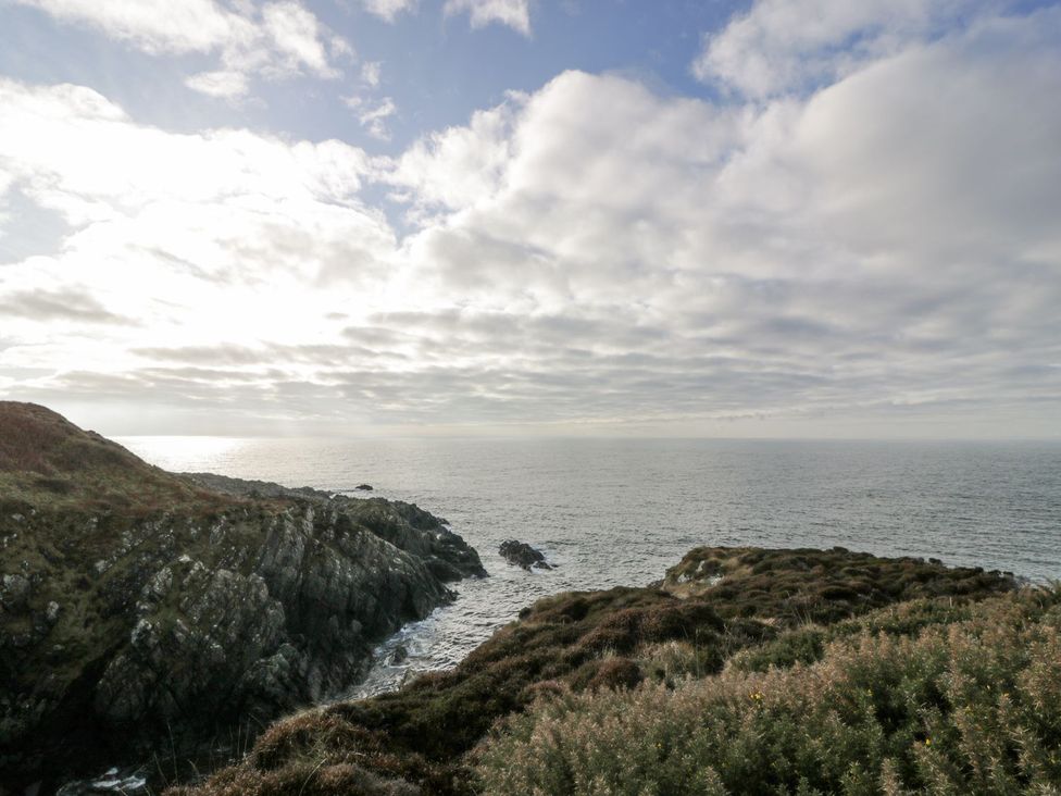 A view of the sea and rocks at Ellies House in Stranraer