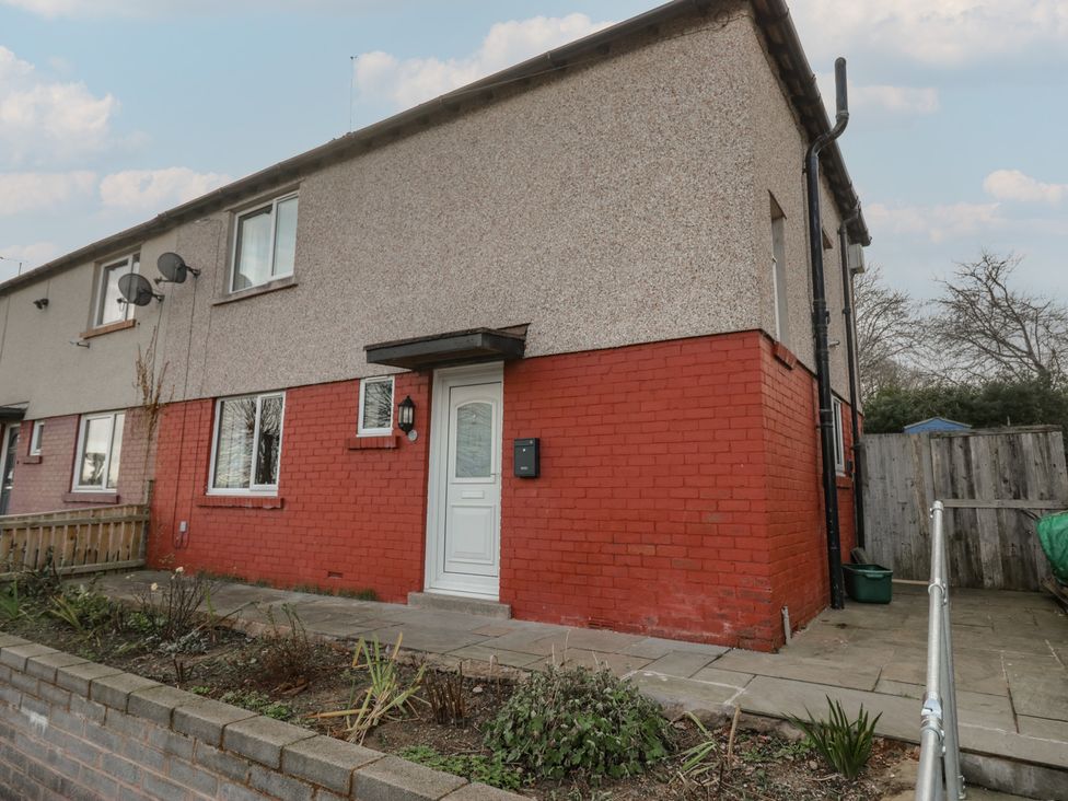 A house exterior with a pathway and garden at Castle Terrace in Penrith