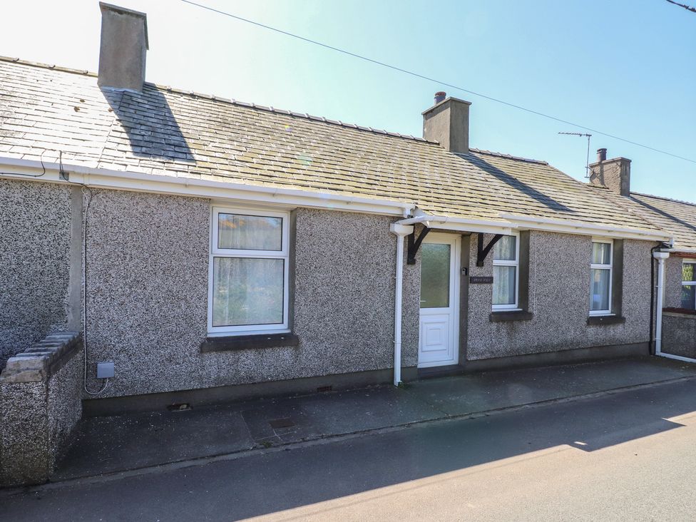 A house with windows and a door at Mona View in Amlwch
