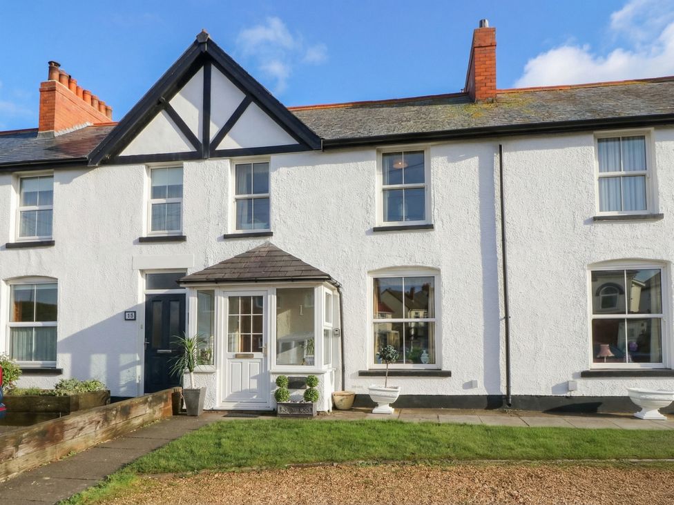 A house with windows and a door at The Hideaway in Penrhyn Bay
