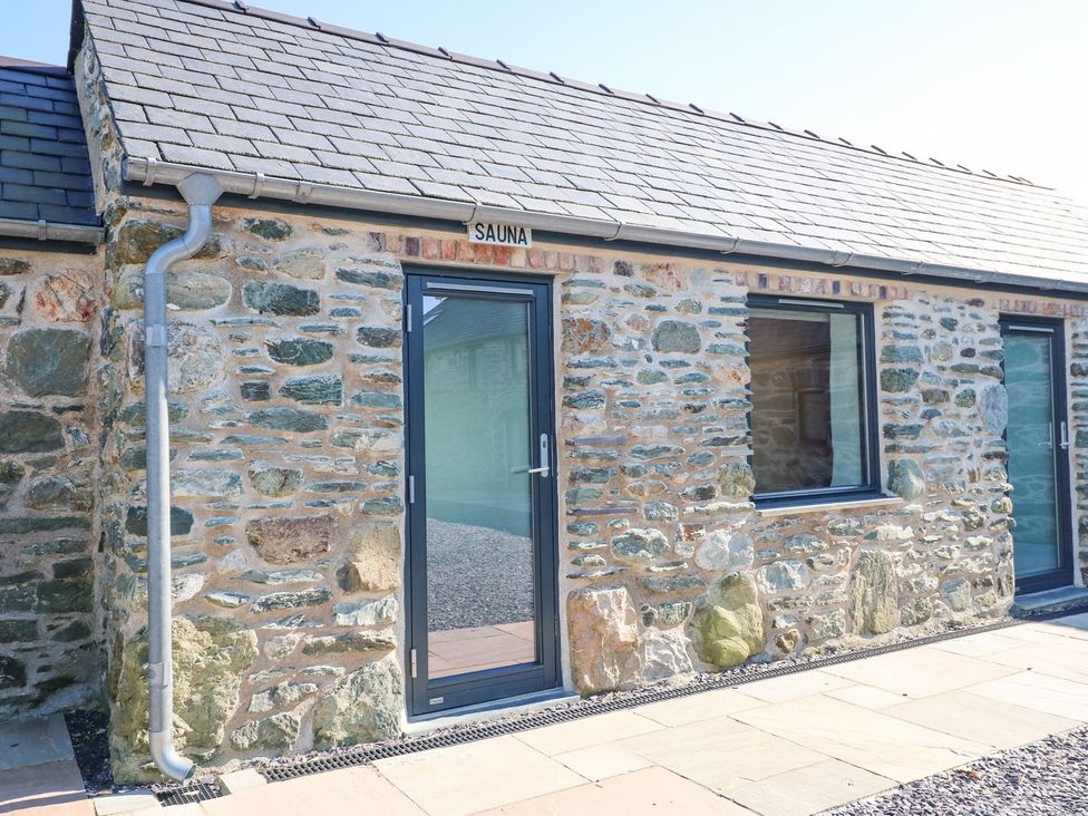 A sauna with a stone exterior at Hen Penmynydd near Llanfachraeth