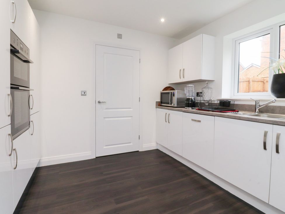 A kitchen with ovens and appliances at 49 Mellings Place 