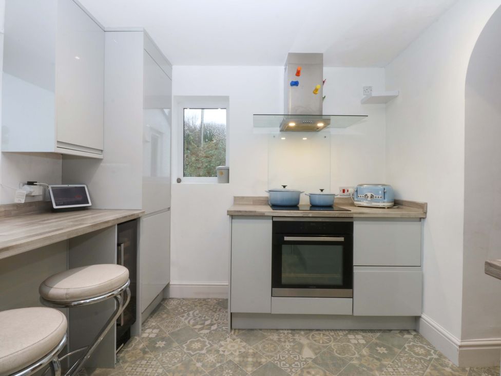A kitchen with countertop and appliances at 4 Brynteg Terrace Menai Bridge