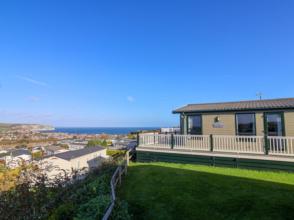 A view of the sea and surroundings from a mobile home at 91 Swanage Coastal Park in Swanage