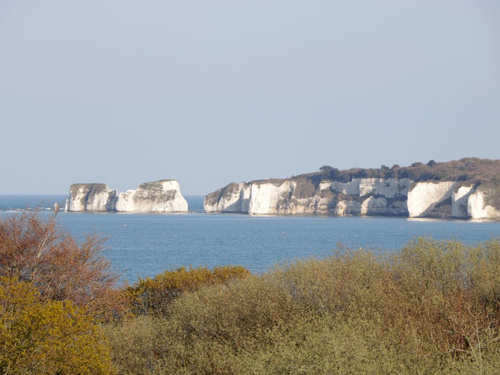 A view of cliffs and the sea at 91 Swanage Coastal Park in Swanage