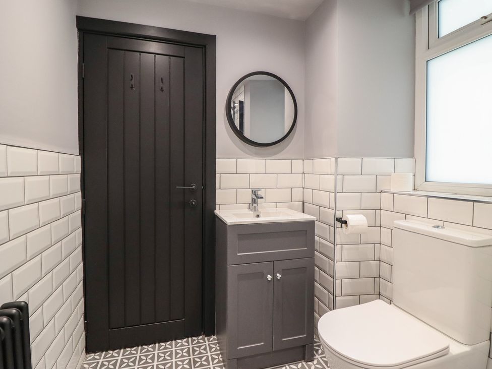 A bathroom with a sink and toilet at Green Bank in Betws-Y-Coed