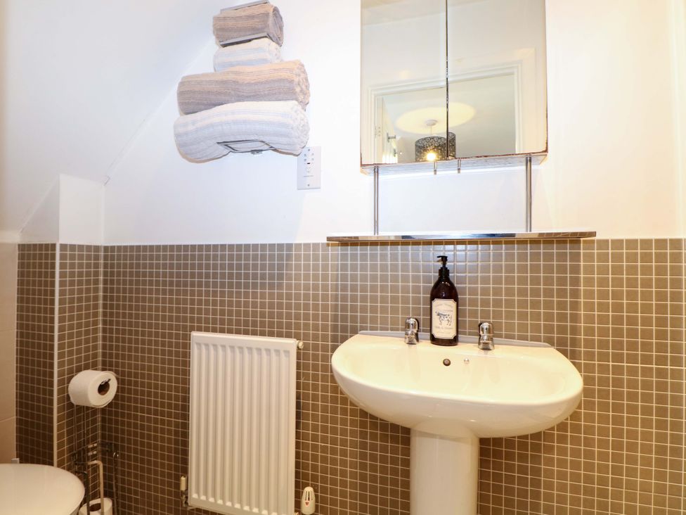 A bathroom with a sink and a toilet at Harbour Way Shoreham-By-Sea