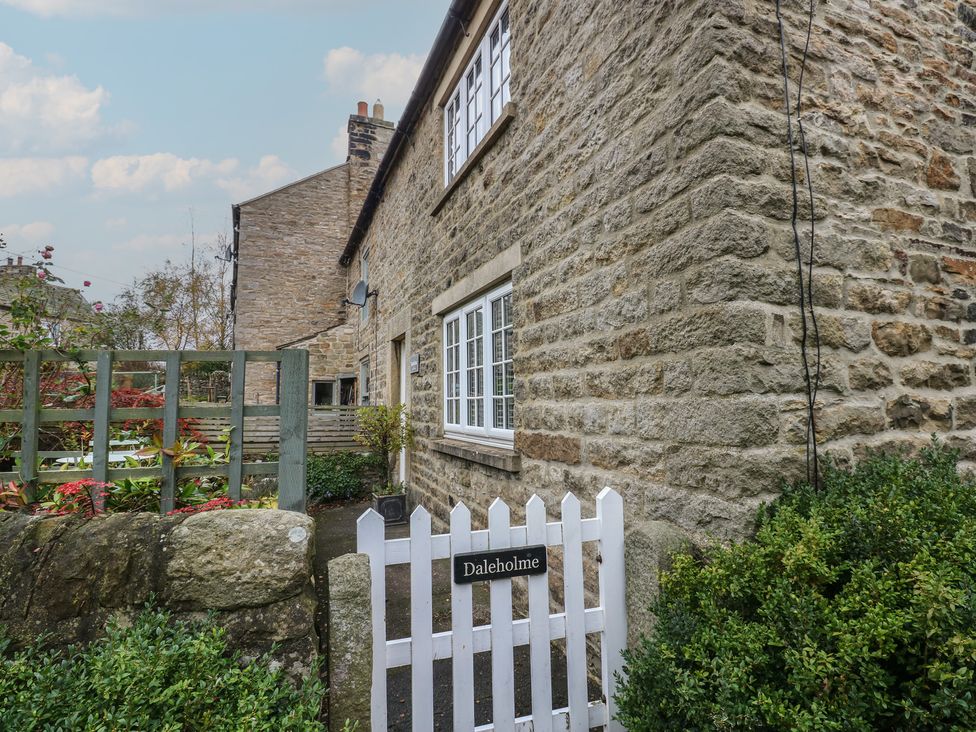 A house with a garden entrance and sign at Daleholme in Barnard Castle