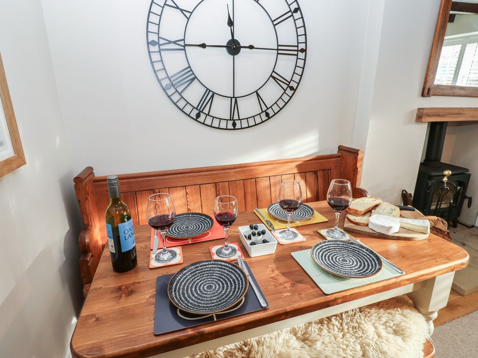 A dining room with a table set for a meal at Daleholme Mickleton, Teesdale