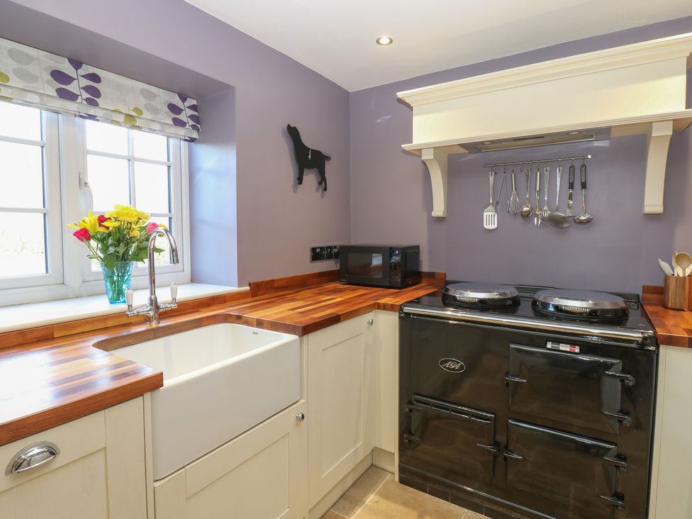 A kitchen with a sink and stove at Daleholme Mickleton, Teesdale
