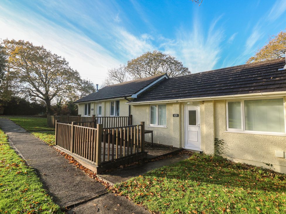 An outdoor area with a house and deck at Little Egret - Number 2