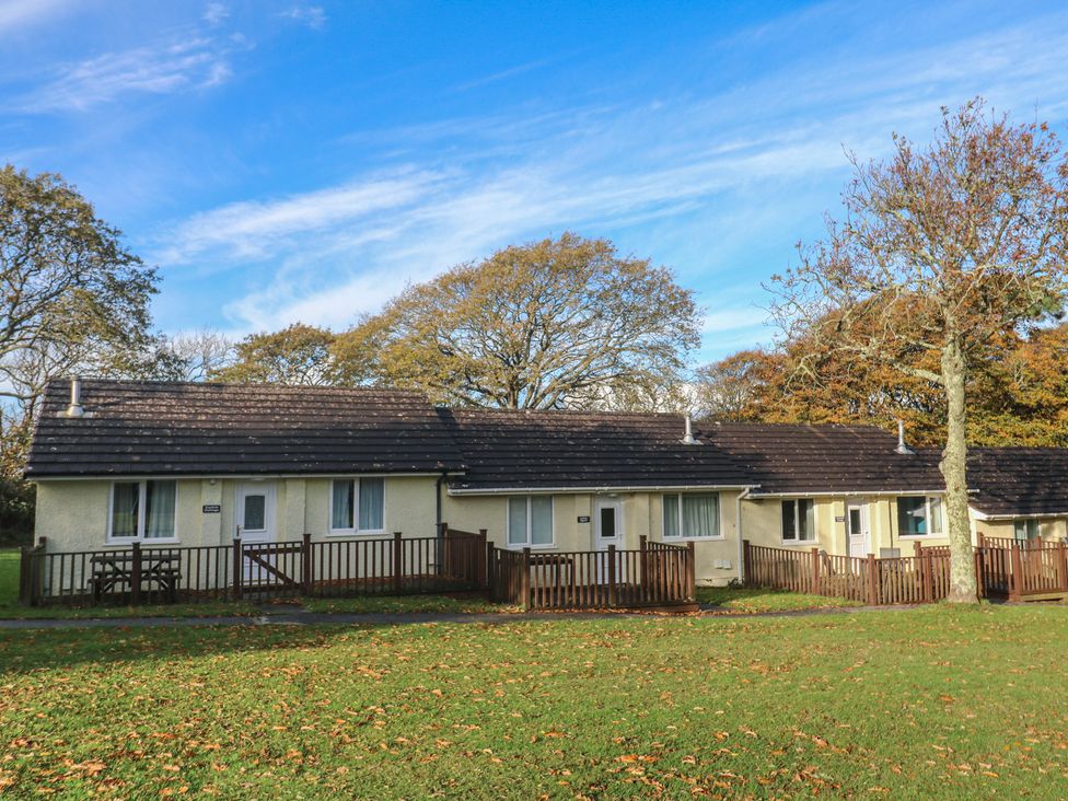 A building with balconies and trees at Little Egret - Number 2