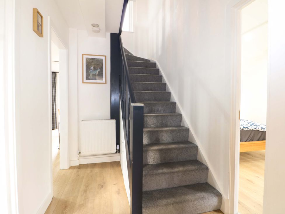 A staircase in a hallway at 7 Oaks Track Carshalton