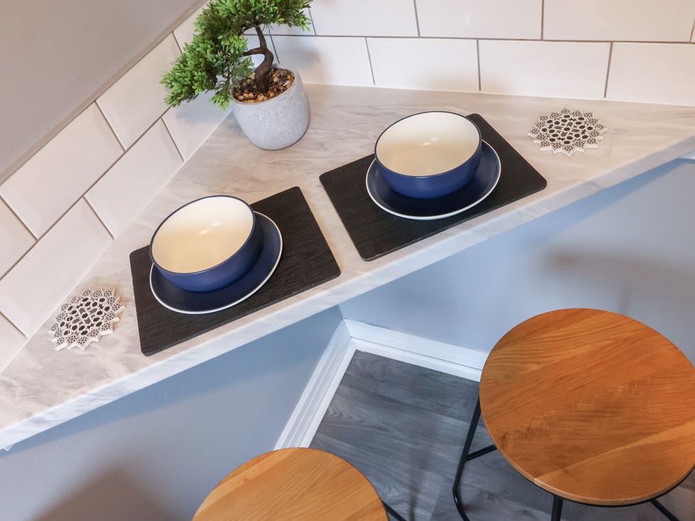 A kitchen countertop with bowls and plant at 127 Bellhouse Way in York
