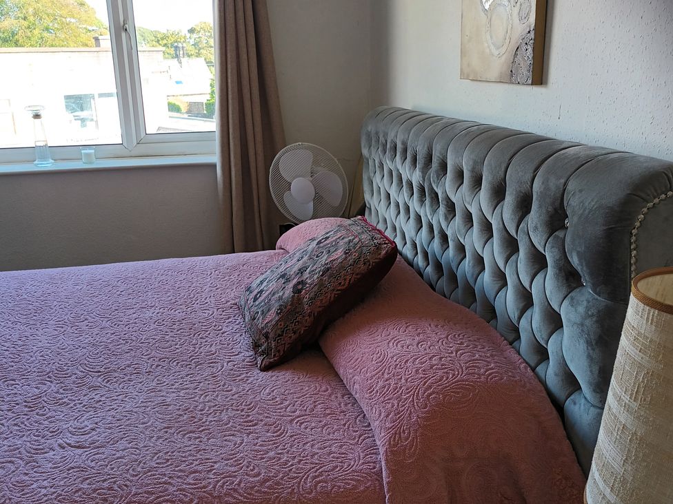 A bedroom with a bed and pillow at 11 Kings Court 