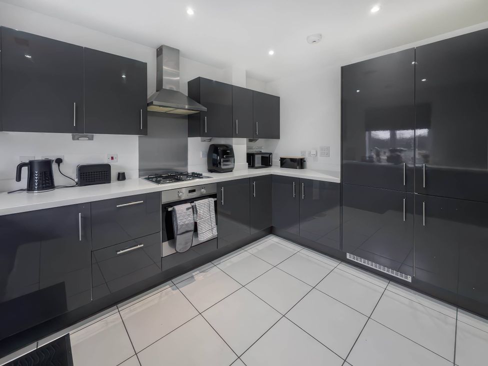 A kitchen with cabinets and appliances at the unspecified location
