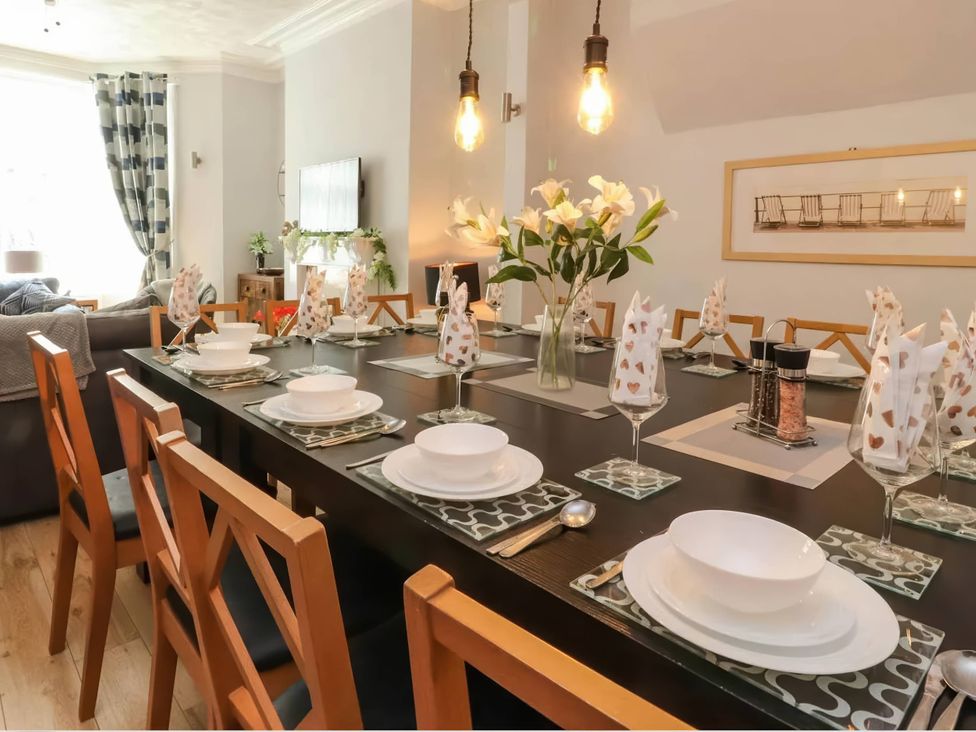 A dining room set for a meal at The Old Barn in Manchester