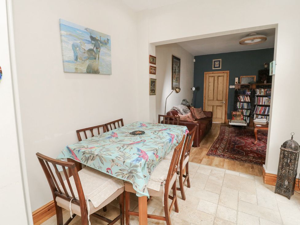 A dining area with a table and chairs at Norbury House in Lincoln