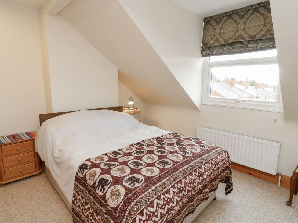 A bedroom with a bed and bedside table at Norbury House in Lincoln