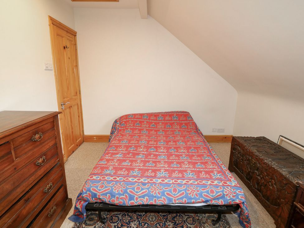 A bedroom with a bed and a drawer at Norbury House in Lincoln