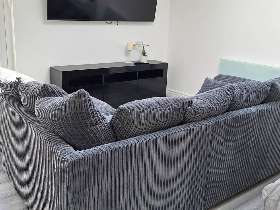 A living room with a sofa and a television at 