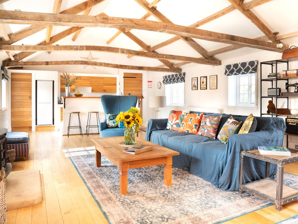 A living room with a sofa and coffee table at the property in 