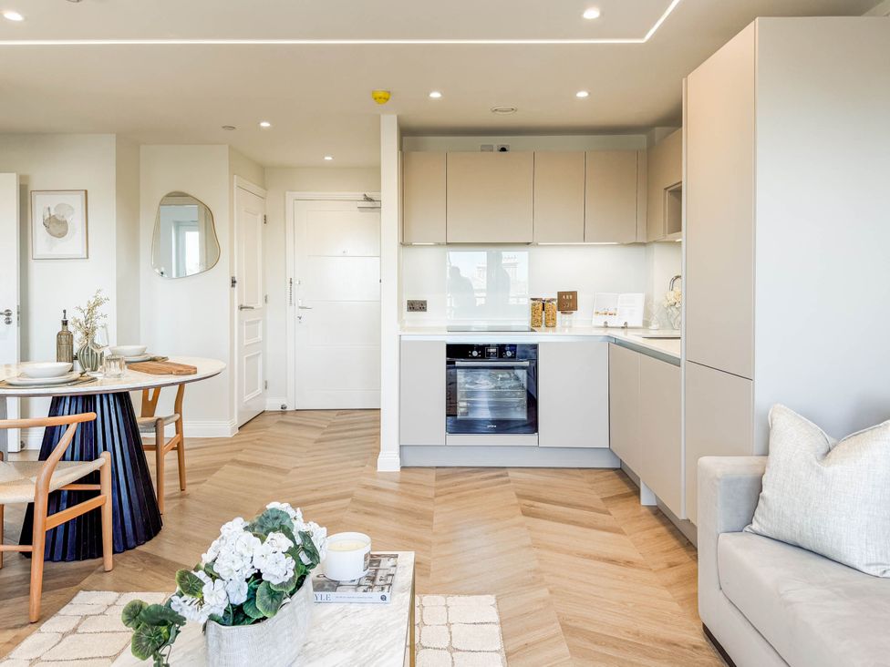 A kitchen with dining area and modern furniture at The Old Barn in Manchester