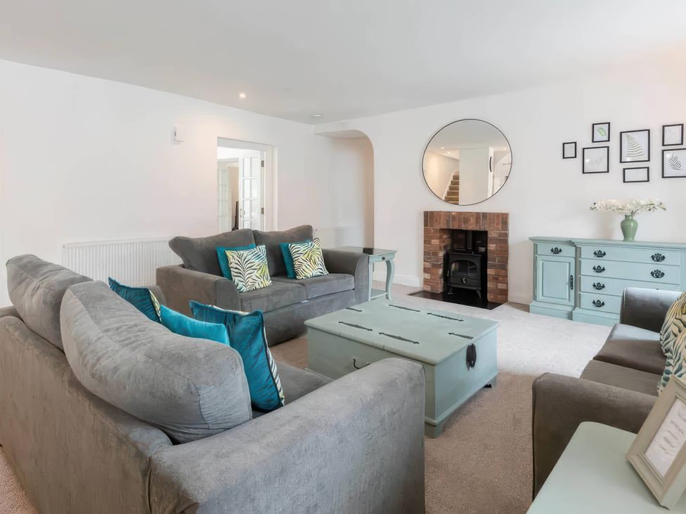 A living room with sofas and a coffee table at the property in location