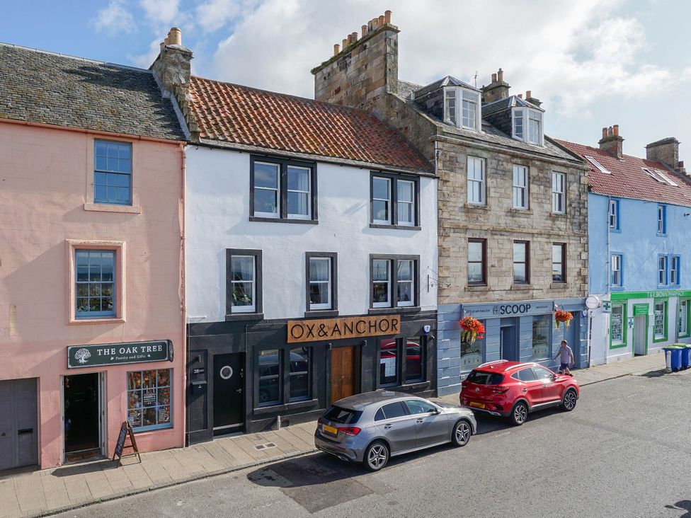 A street view with buildings and cars at 
