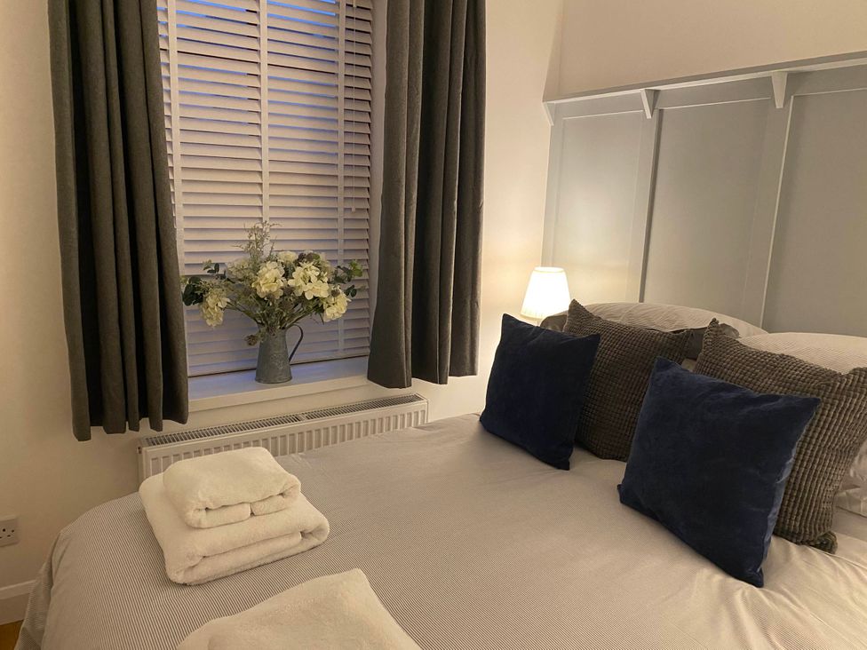 A bedroom with bed and decorative items at 