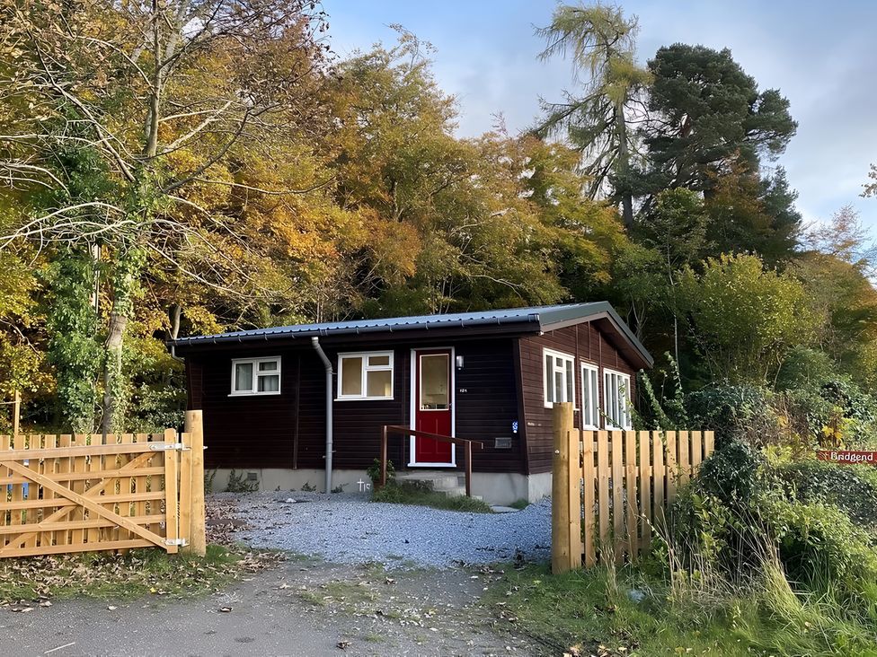 A house with a gate in front at a location in nature