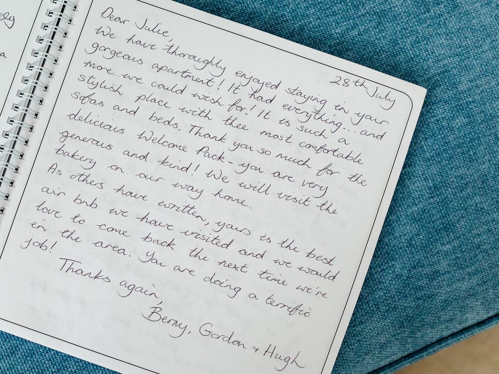 A handwritten note in a notebook at Wee Jules By The Sea