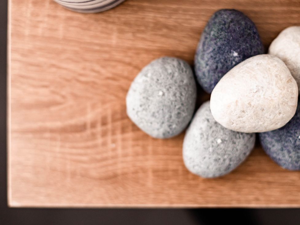 Decorative stones on a wooden surface in a living room