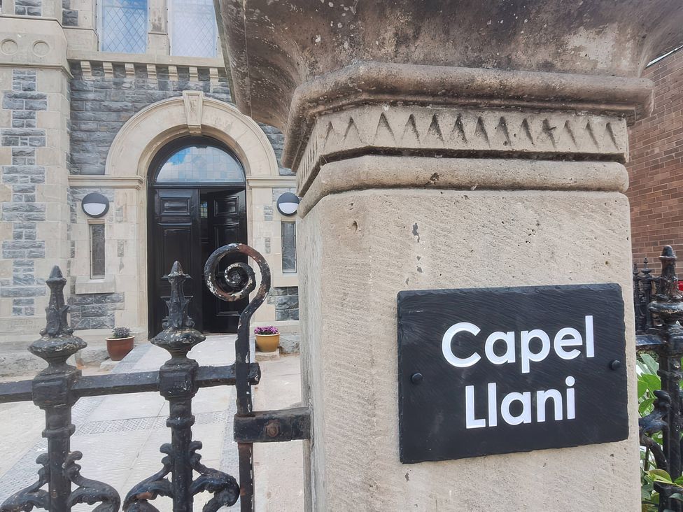 An entrance with a sign at Capel Llani in Llanidloes