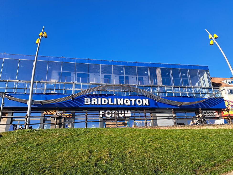 A building with a sign reading Bridlington Forum in Bridlington