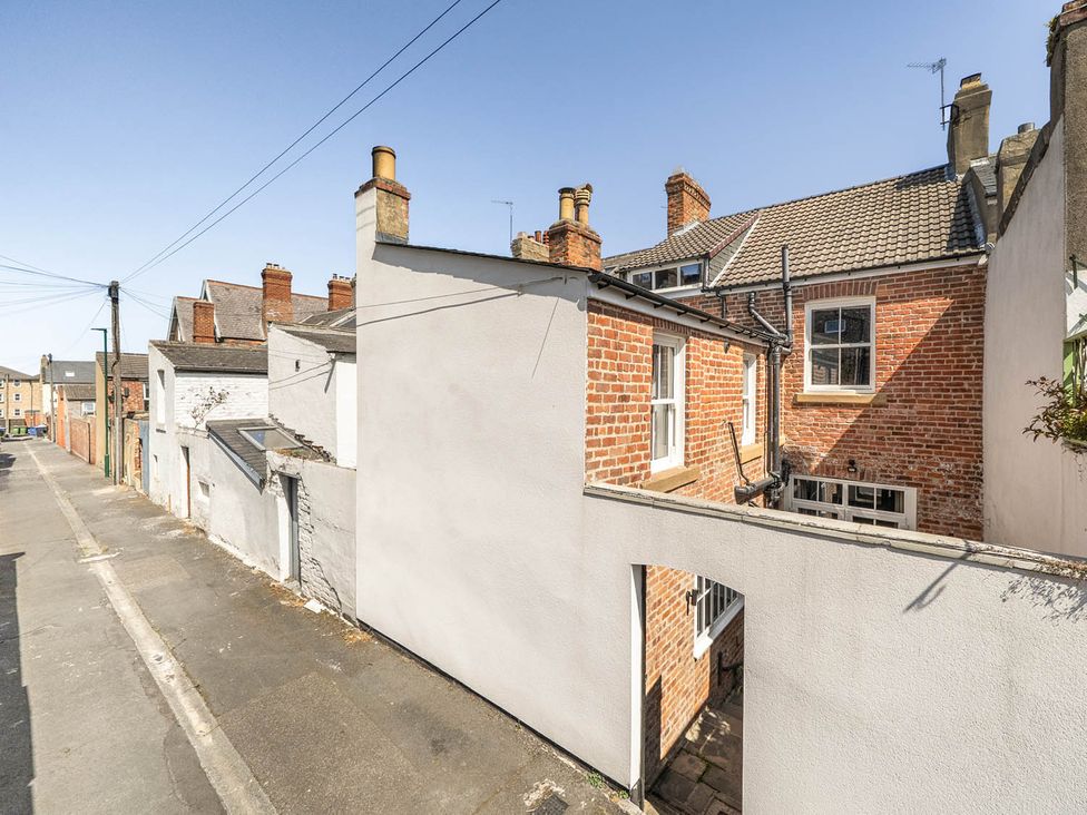 An outdoor area with brick buildings and a clear blue sky at Victorian Beach House Saltburn-By-The-Sea