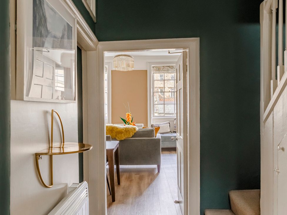A hallway with a view of a living room at Stay Robun