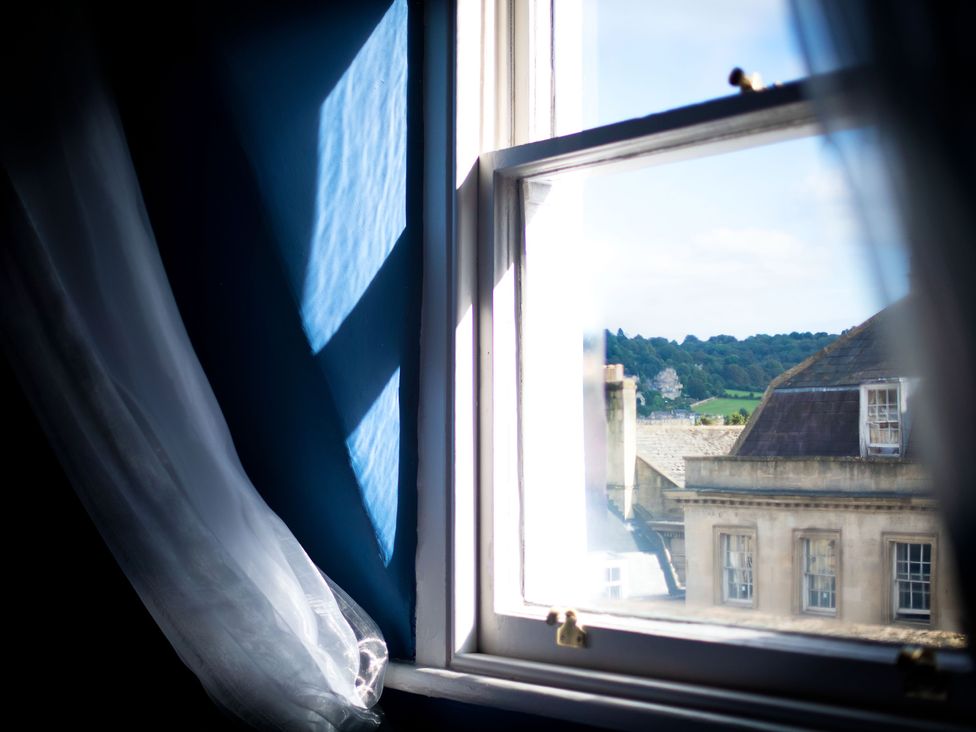 A window with a view of a landscape at Stay Robun 