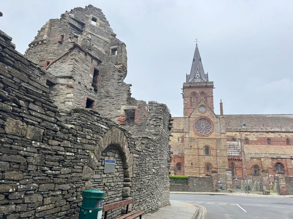 A view of historical ruins and a church in a street setting at Withi-Gill 